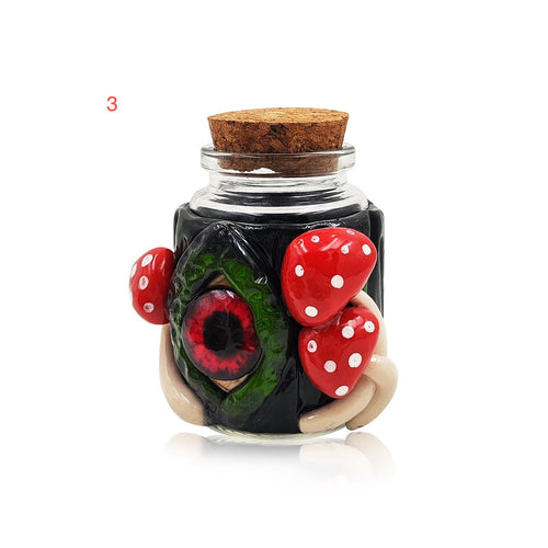 Eye and mushroom glass stash jar with cork lid