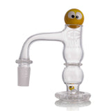 Mini_colored_terp_ball_and_two_clear_terp_pearls_displayed_with_Odyssey_banger