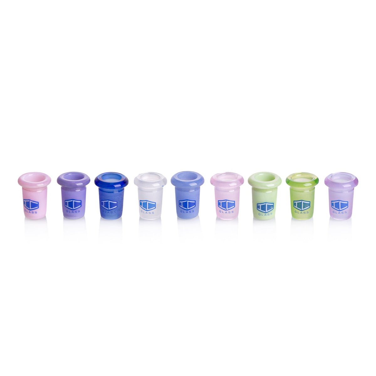 Close-up of various colored borosilicate glass adapters for water pipes.
